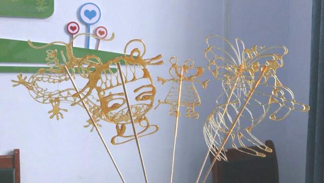 九游体育：【打造“四个强市”建设“幸福家园平安永济”】勺为笔糖为墨绘出非遗新活力(图4)